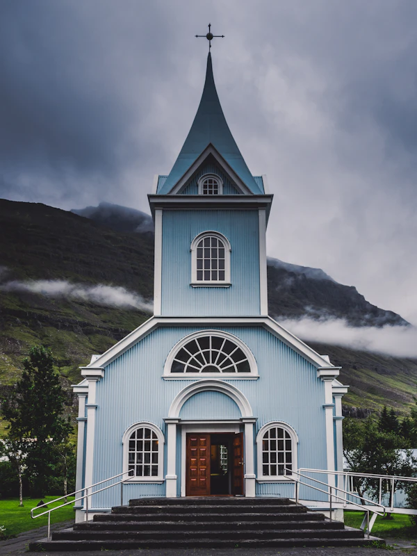 Church interior with warm candlelit lighting